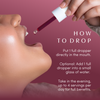 Apothékary Wine Down™ tincture being dropped into a woman's mouth with text instructions: take 1 full dropper directly in mouth or in water, in the evening, up to 4 servings daily for full benefits.